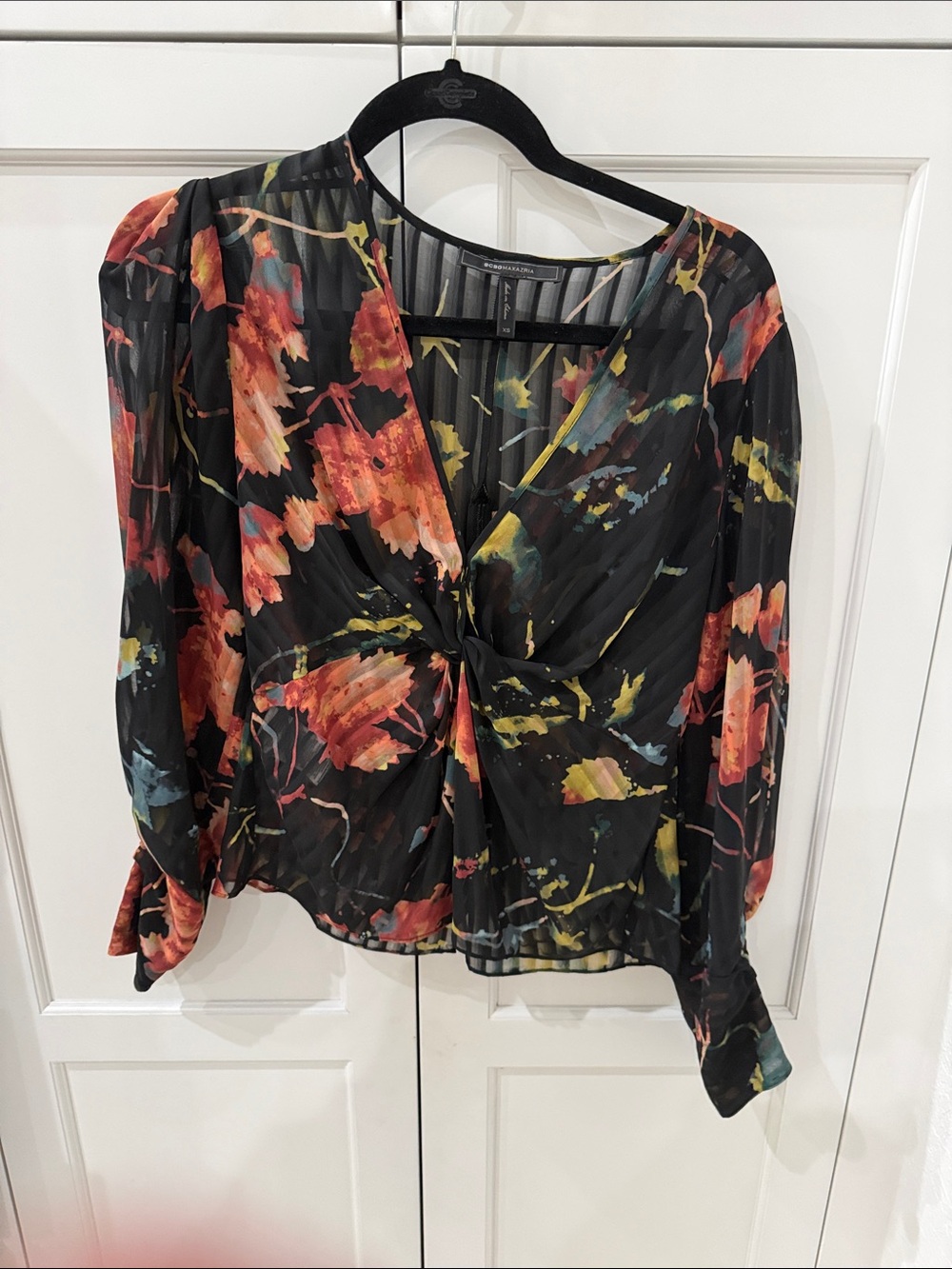 Express Black Floral Twist-Front Blouse with Red and Yellow Highlights